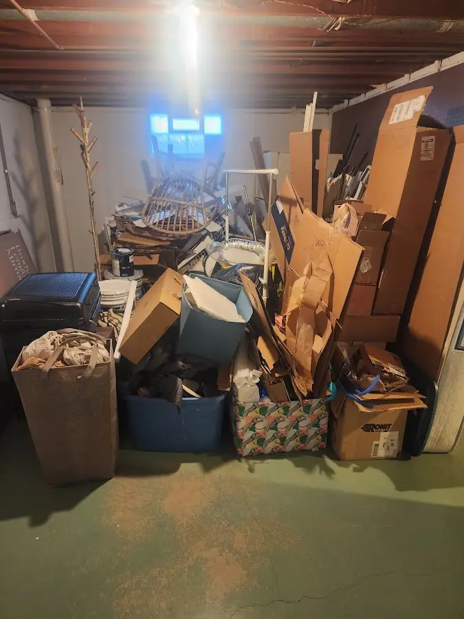 Roll-off dumpster container at job site for 8 Yard Dumpster Rental in Huntsville